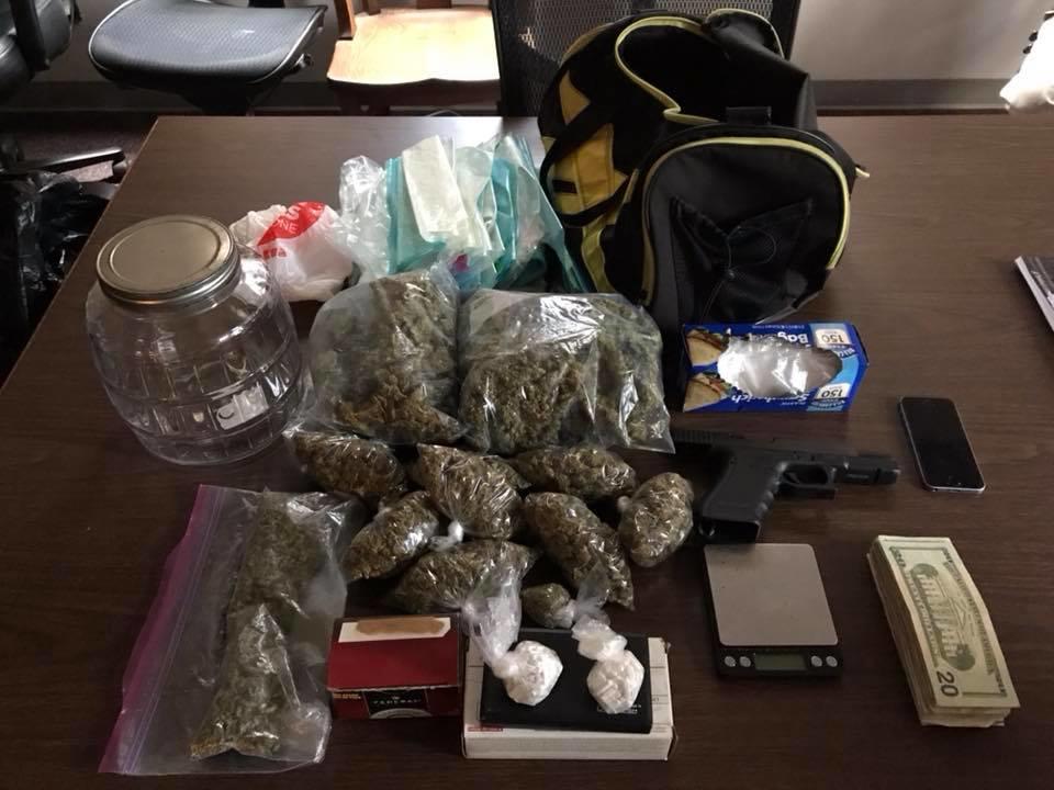 2.3 pounds of marijuana packaged for resale, approximately 48 grams of Xanax, a semi auto pistol, and $687 cash 