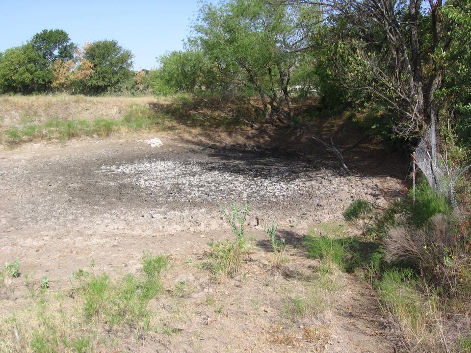 A dried out pond
