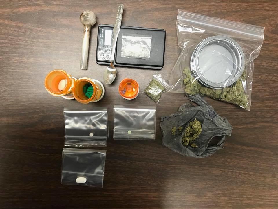Methamphetamine, marijuana and numerous pill bottles of both controlled substances & dangerous drugs, digital scales and other drug paraphernalia items