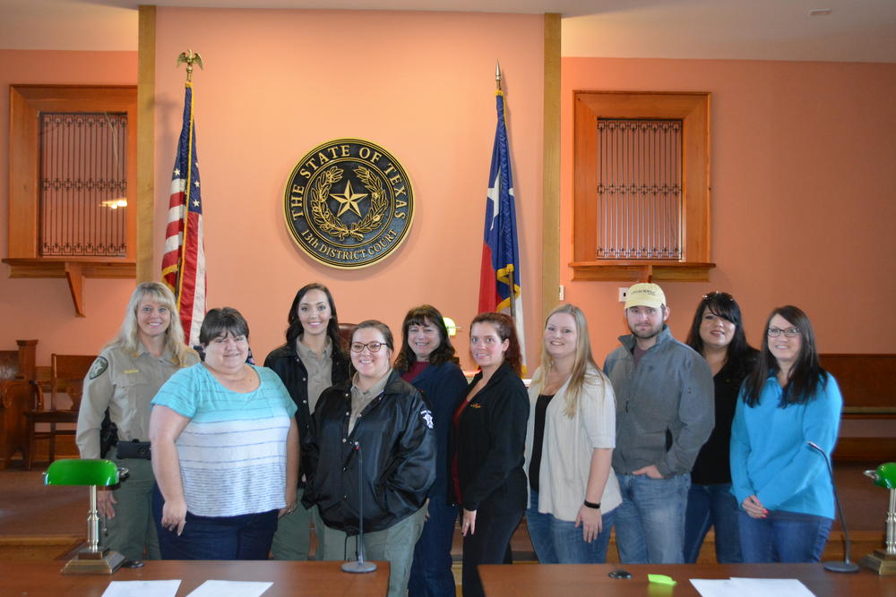 Navarro County Communications Officers stand smiling  