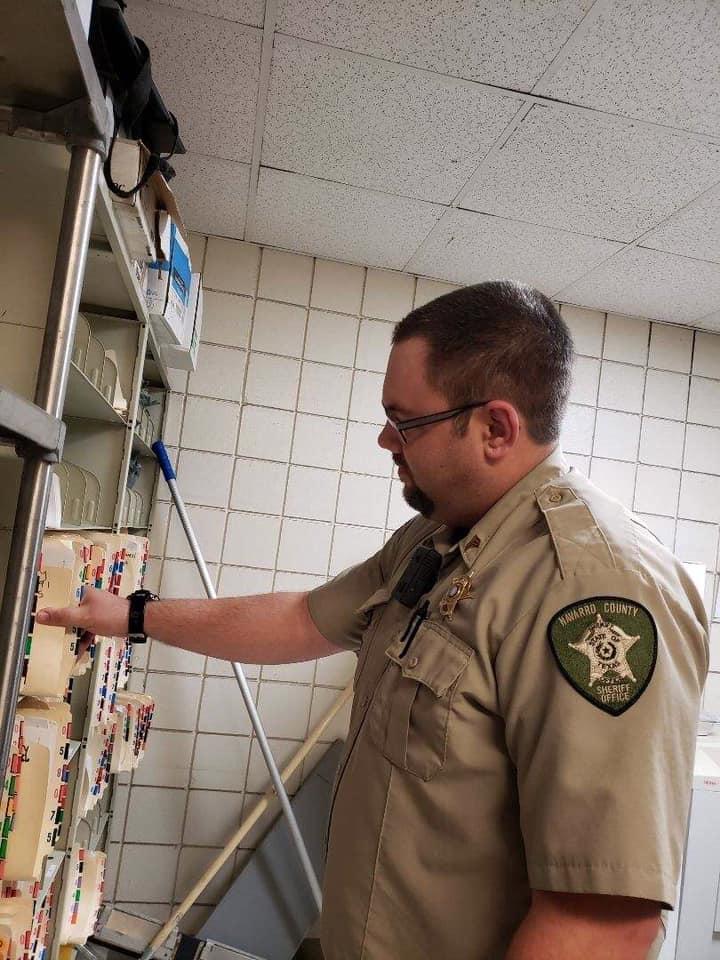 Sgt Kevin Jernigan filing folders