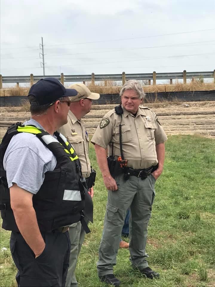 Navarro County Sheriff’s Office along with units from the Waxahachie Fire and Rescue dive team wait for news