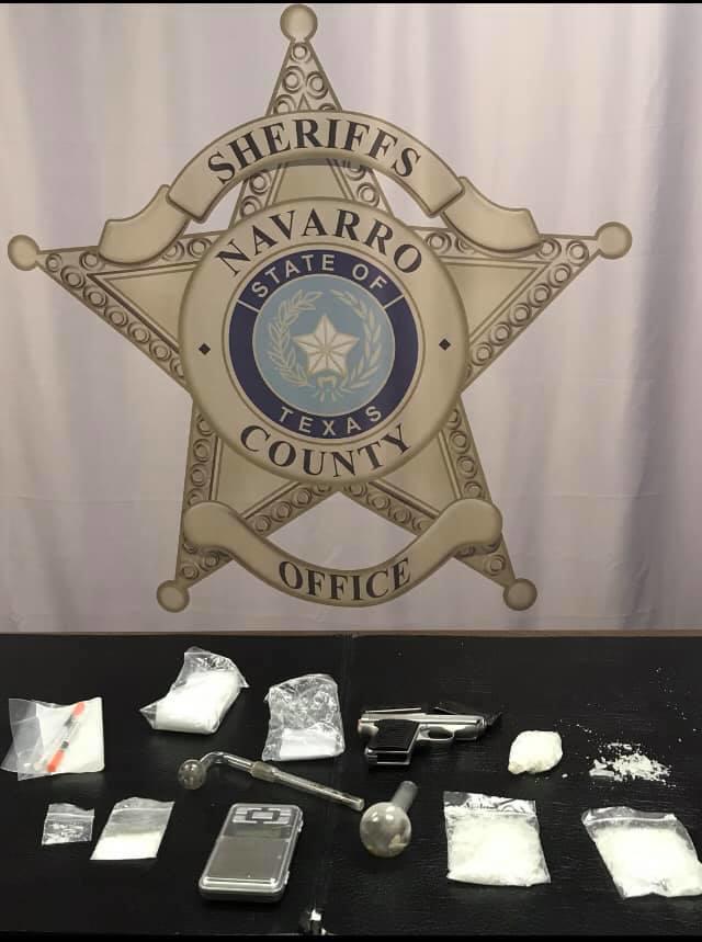 approximately 3 ounces of methamphetamine, drug paraphernalia, a pistol and $407 in U.S. currency