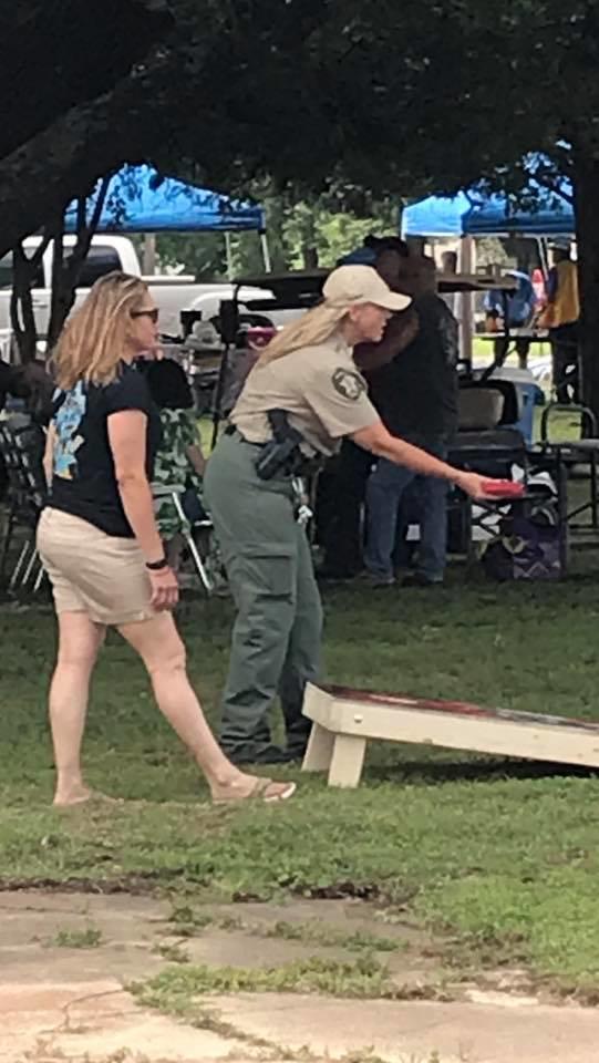 Playing cornhole 