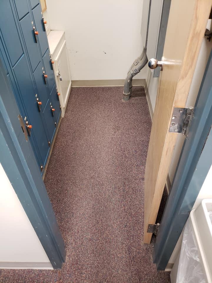 interior of sheriff's office with old carpet