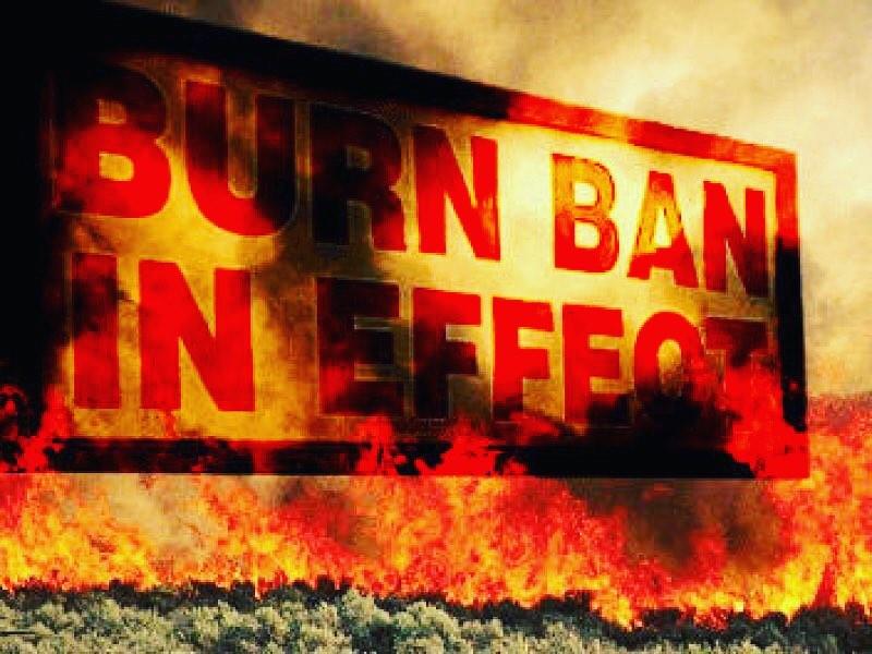 design with flames that says Burn Ban In Effect