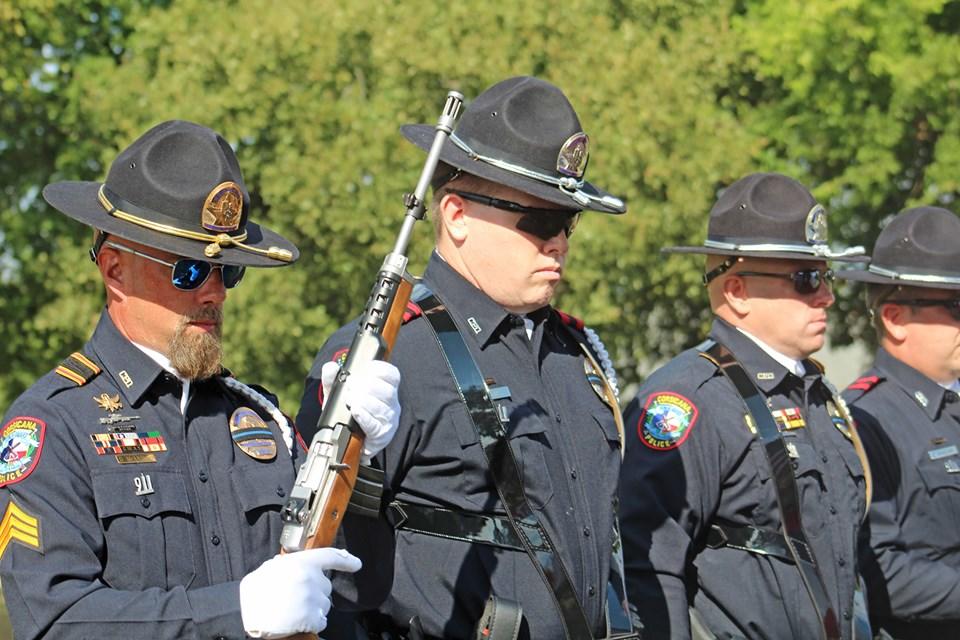 Men holding rifles