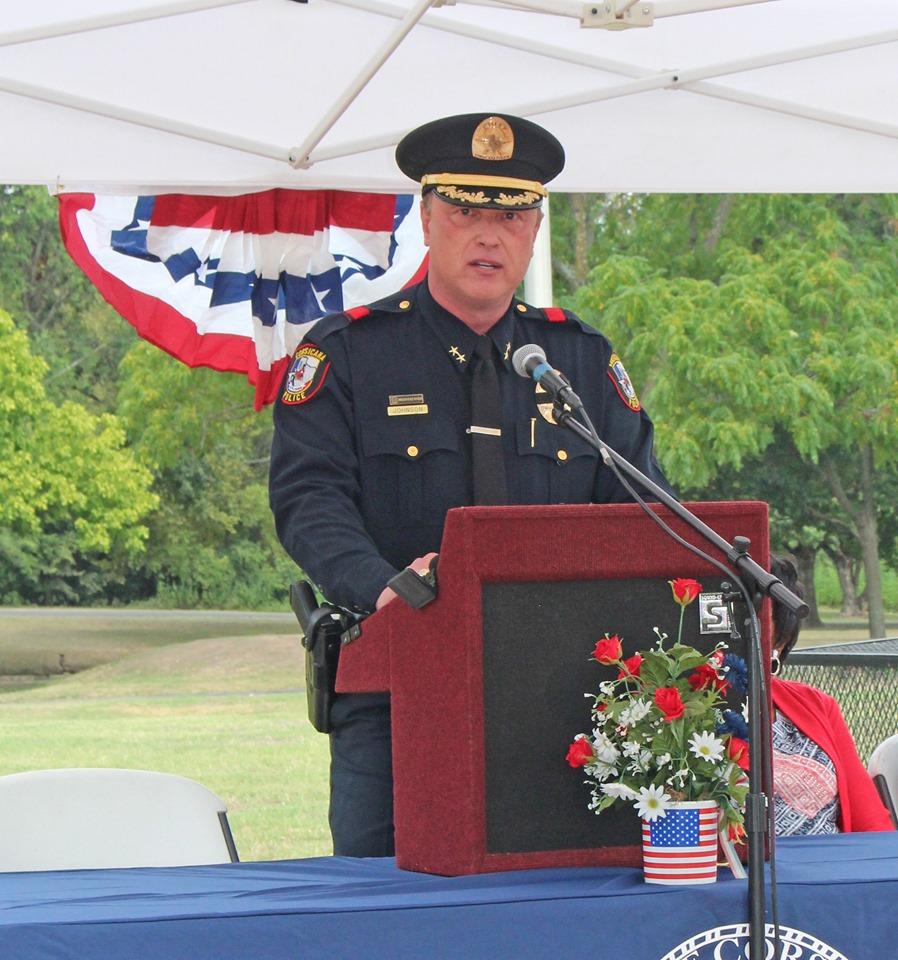 Officer at the podium giving a speech