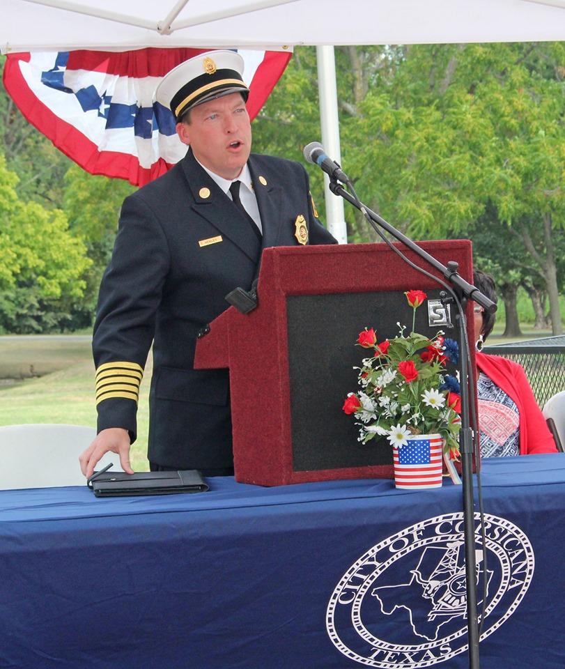 military officer at the podium giving a speech