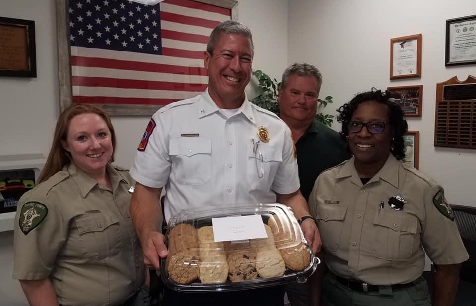 Officers with cookies