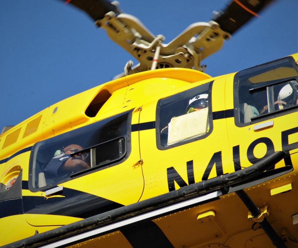 close-up shot of a police helicopter flying