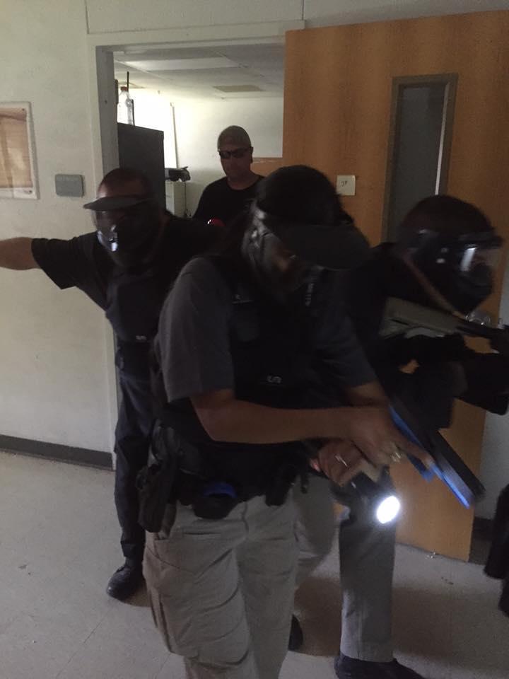 Deputies walking out of a classroom