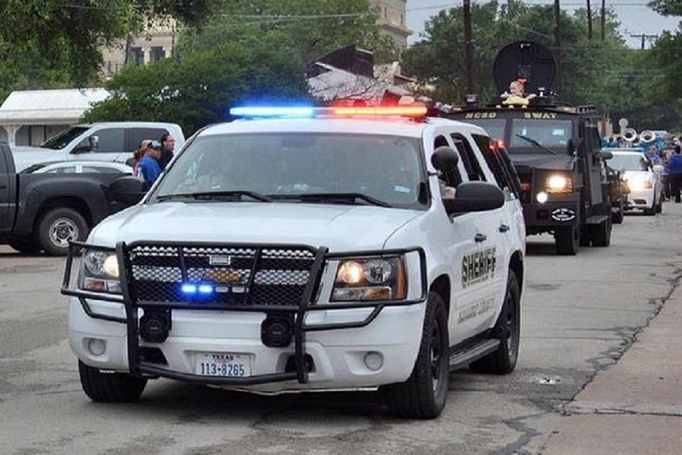 Sheriff vehicle leading the Corsicana Derrick Days Parade