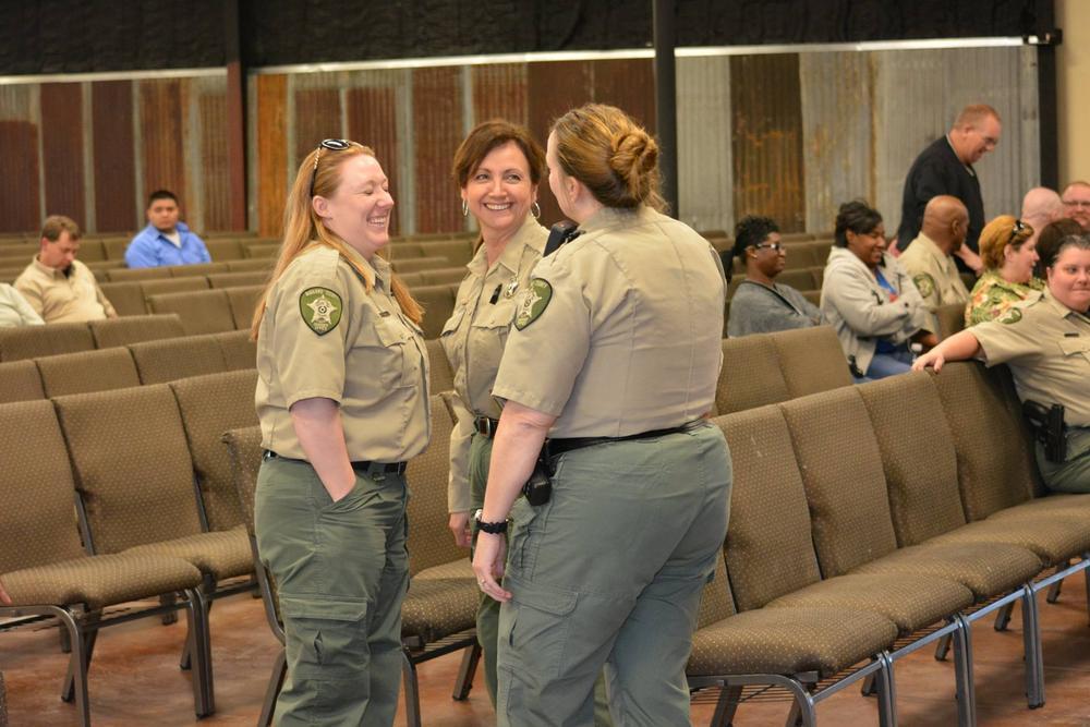 three deputies talking