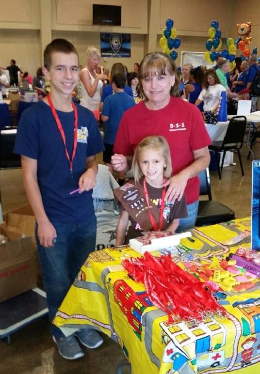 Family smiles at the back to school rally 