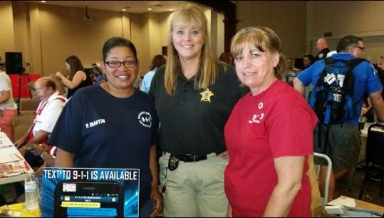 Offices pose together at the back to school rally