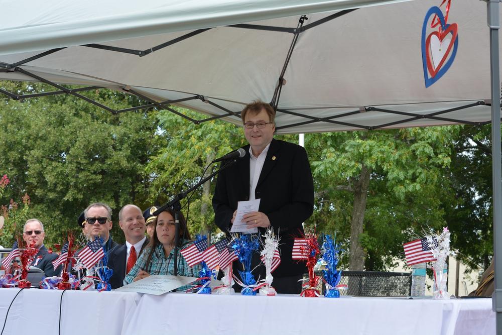 Navarro County Officers speaking at the Patriot's Day Ceremony at Bunert Park