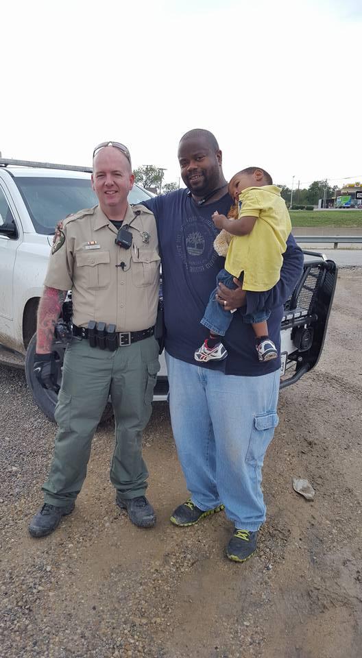 Keith Lewis helping a stranded motorist