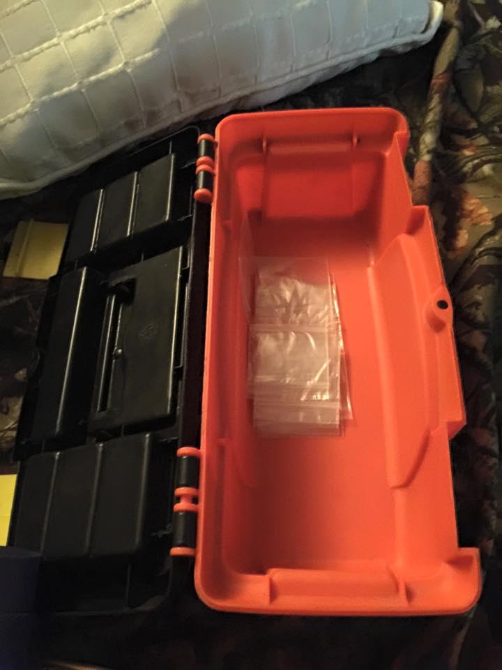 Toolbox containing little plastic baggies