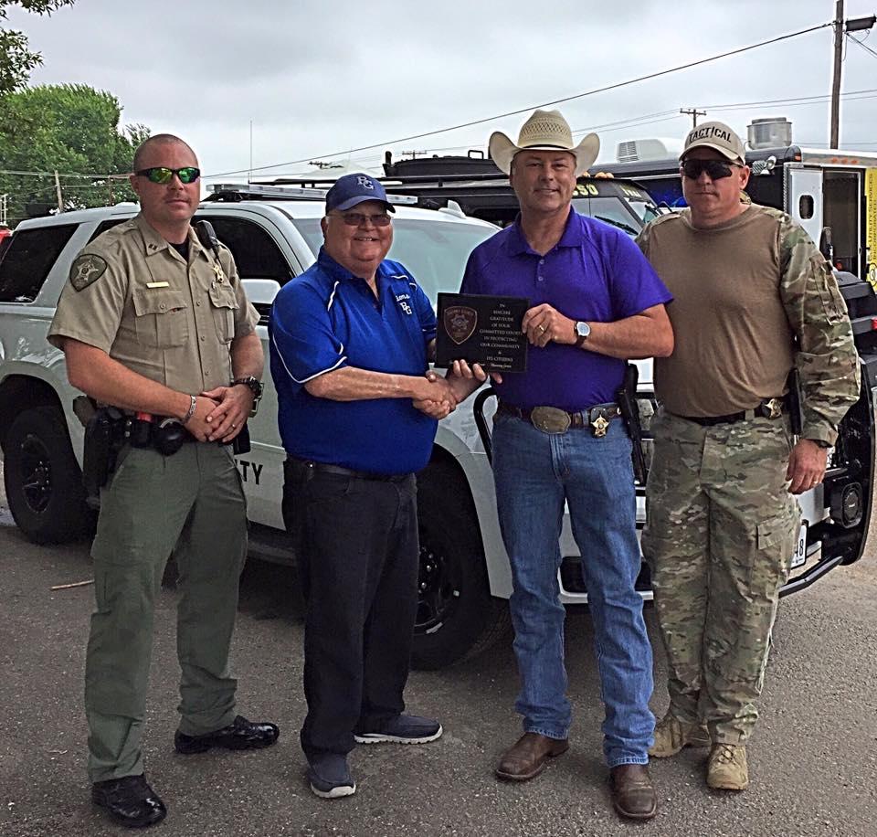 Officers stand together at the Annual Memorial Day Parade