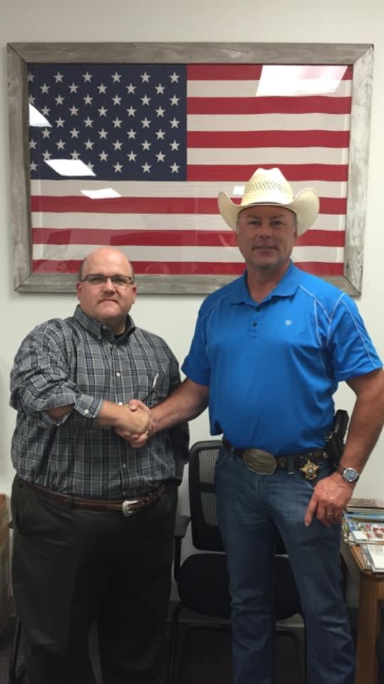 Ed Straubing is welcomed back by Sheriff Tanner 