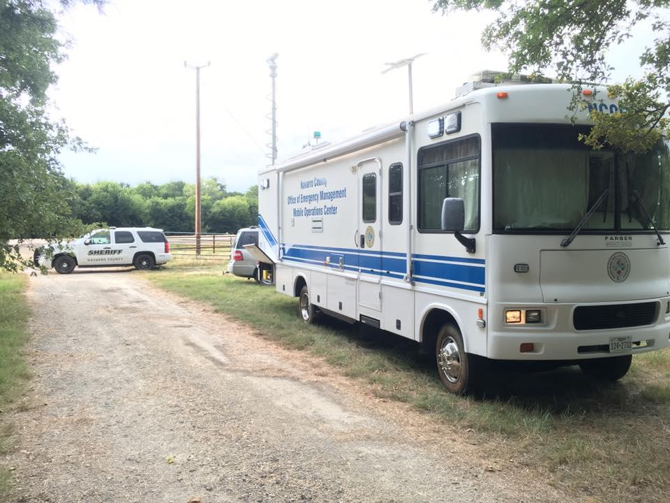 Navarro County Sheriff's vehicle and the Office of Emergency Management Mobile Operations Center 