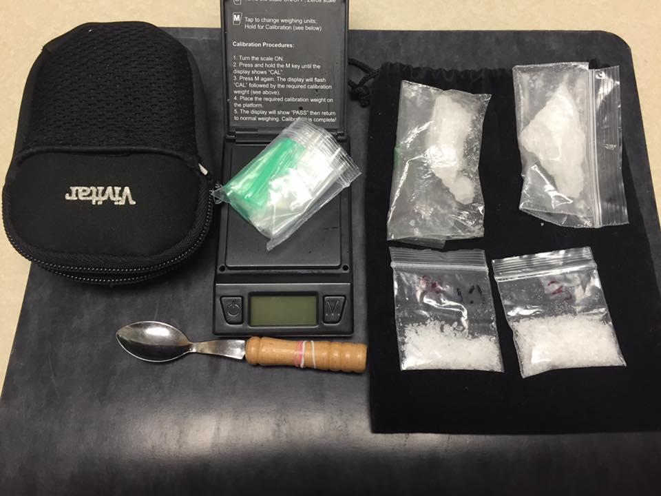 21 grams of methamphetamine, a spoon and a digital scale