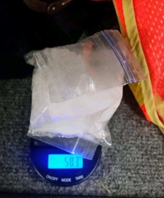 58 grams of methamphetamine on a digital scale