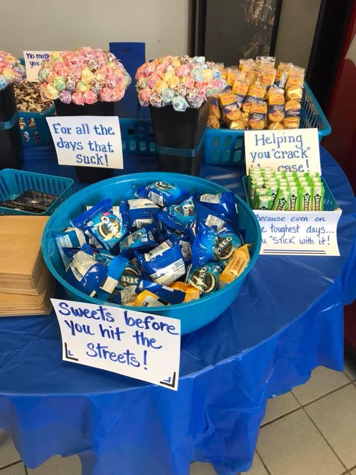 Sweet Treats before you hit the streets! Lots of snacks and encouraging signs cover the table