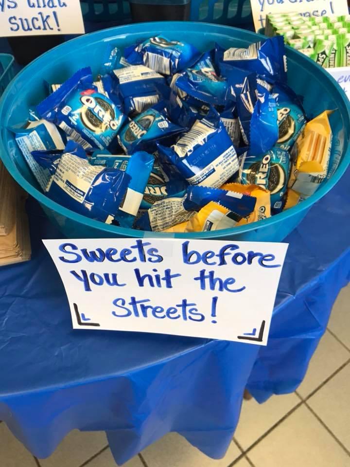 Sweet Treats before you hit the streets! Lots of snacks and encouraging signs cover the table