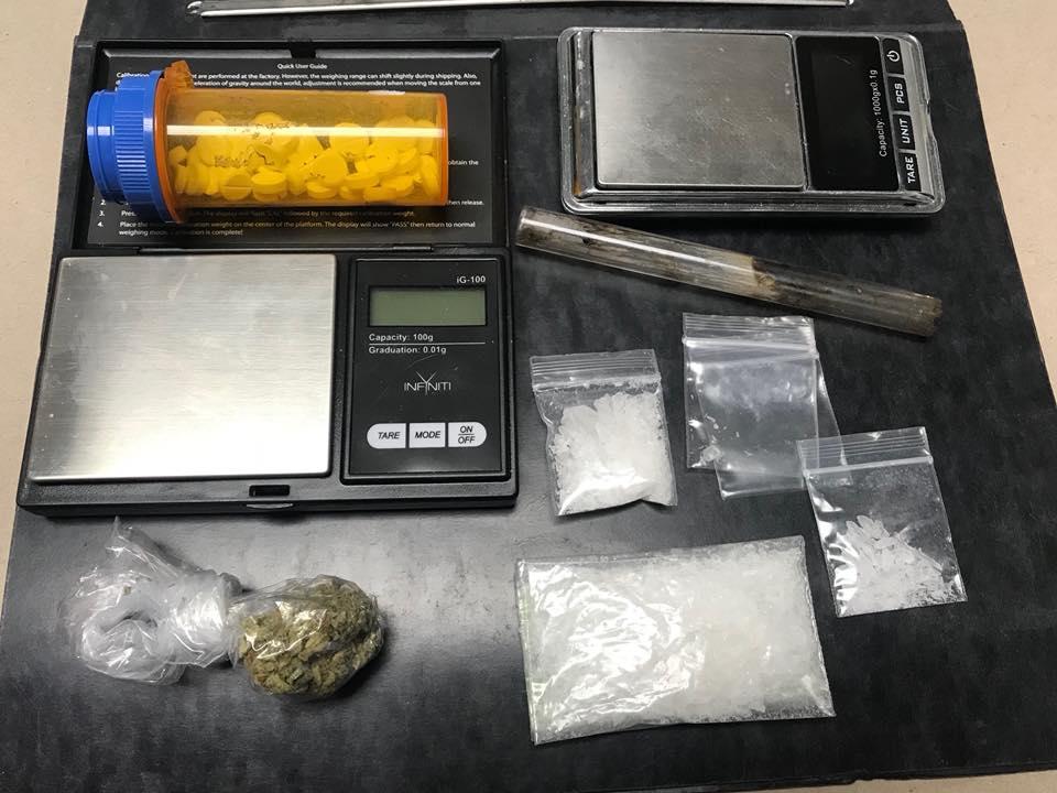Methamphetamine, marijuana, pills, a pipe, pills and a digital scale